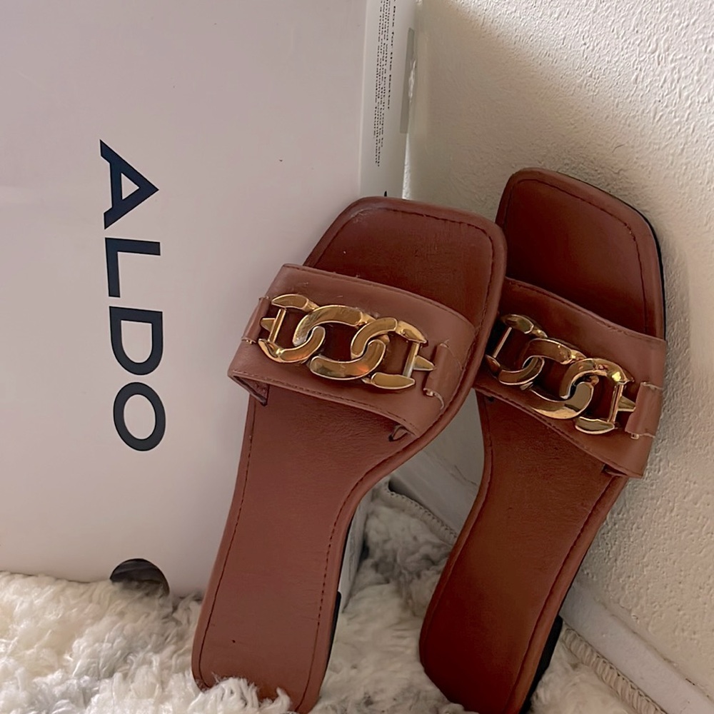 Brown and gold sandals